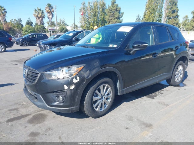 JM3KE2CY6G0885409 Mazda py