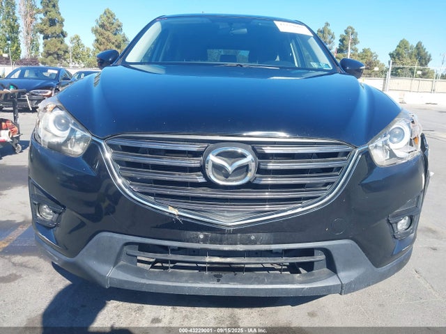 JM3KE2CY6G0885409 Mazda py