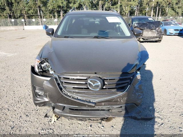 JM3KE4CY9G0631933 Mazda py