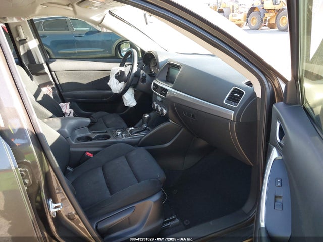 JM3KE4CY9G0631933 Mazda py