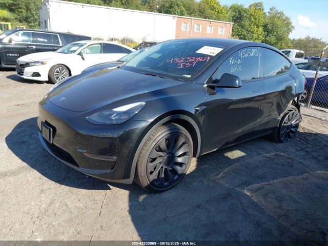 2023 TESLA MODEL Y 7SAYGDEE9PF880253 Photo 1