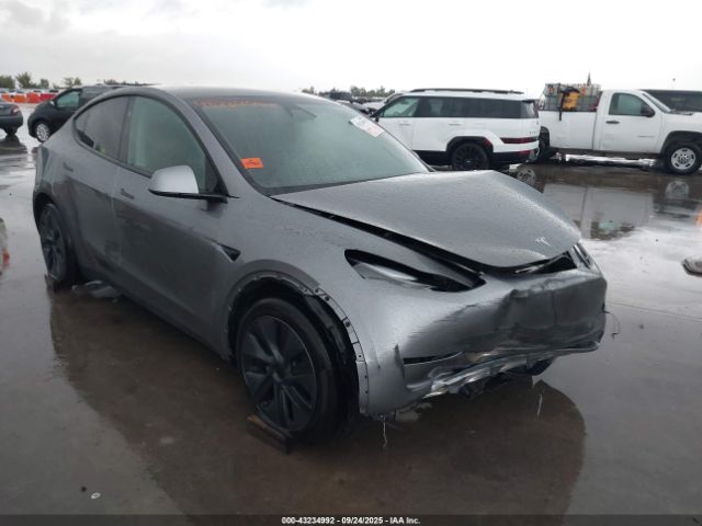 2024 TESLA MODEL Y 7SAYGAEE6RF194446 Photo 0