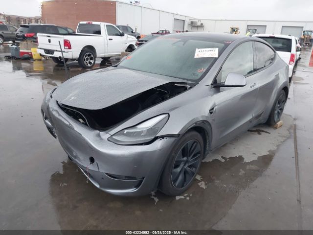 2024 TESLA MODEL Y 7SAYGAEE6RF194446 Photo 1