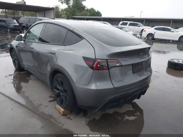 2024 TESLA MODEL Y 7SAYGAEE6RF194446 Photo 2