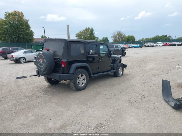 1C4HJWDG2EL311591 Jeep Wrangler