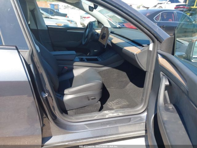 2023 TESLA MODEL Y 7SAYGDEE4PA144270 Photo 4