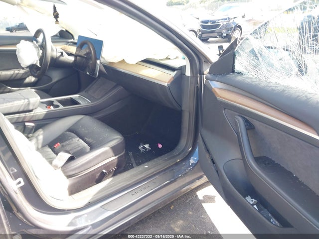 2023 TESLA MODEL 3 5YJ3E1EAXPF462938 Photo 4