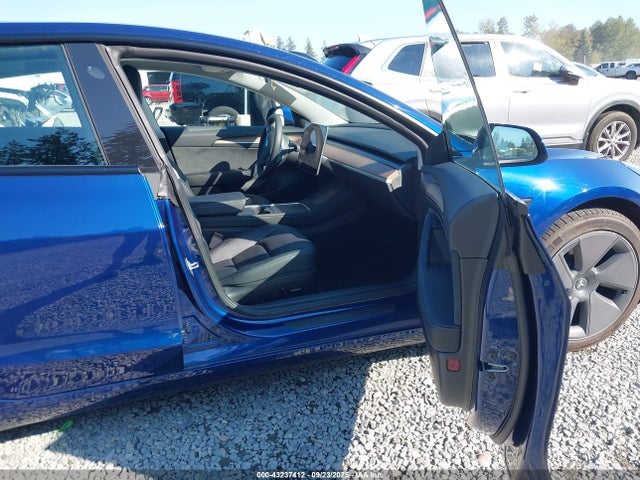 5YJ3E1EA0PF609798 Tesla 2023
