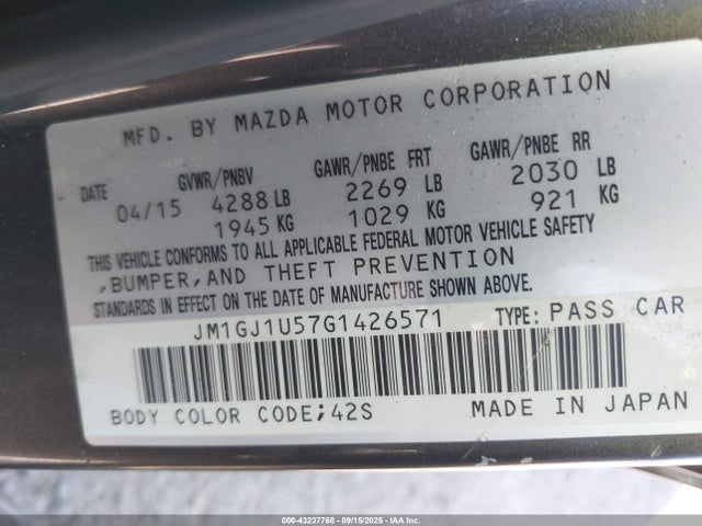 JM1GJ1U57G1426571 Mazda py