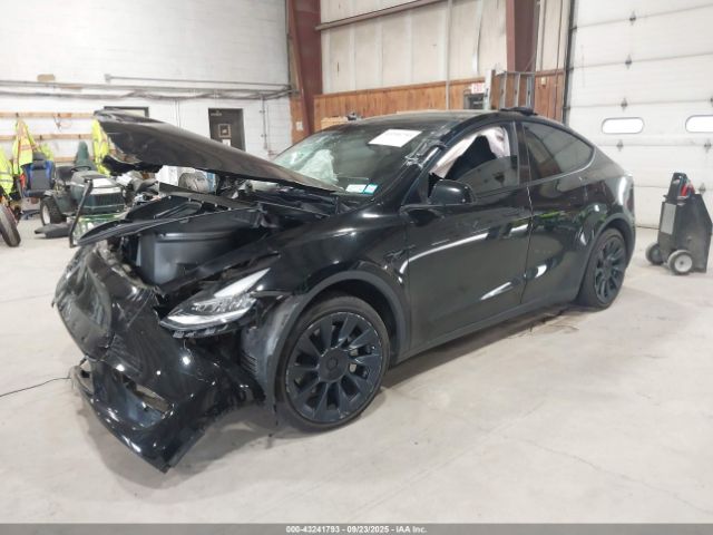 2022 TESLA MODEL Y 7SAYGAEE0NF506285 Photo 1
