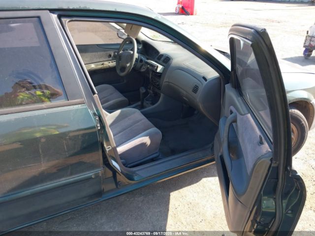 1999 MAZDA PROTEGE JM1BJ2219X0166745 Photo 4