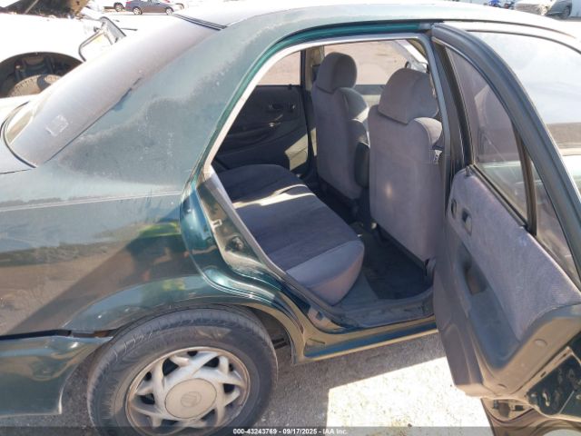 1999 MAZDA PROTEGE JM1BJ2219X0166745 Photo 7