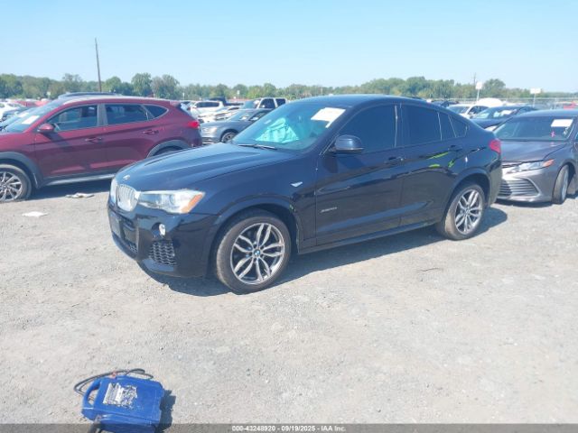 2015 BMW X4 5UXXW5C56F0E87412 Photo 1