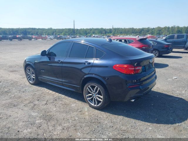 2015 BMW X4 5UXXW5C56F0E87412 Photo 2