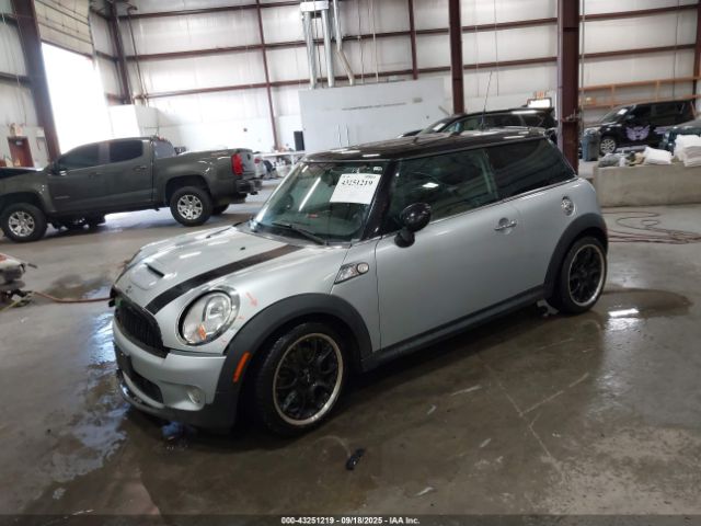 2009 MINI COOPER S WMWMF73519TT99977 Photo 1