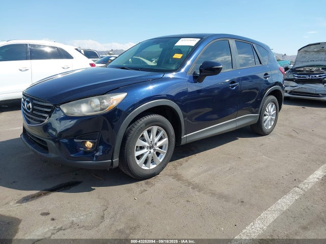 JM3KE2CY9G0797034 Mazda py