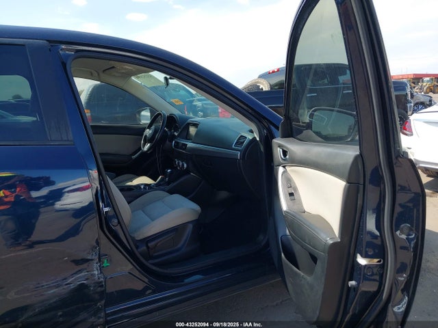 JM3KE2CY9G0797034 Mazda py