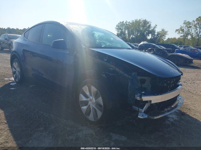 2023 TESLA MODEL Y 7SAYGDEE4PA125024 Photo 0