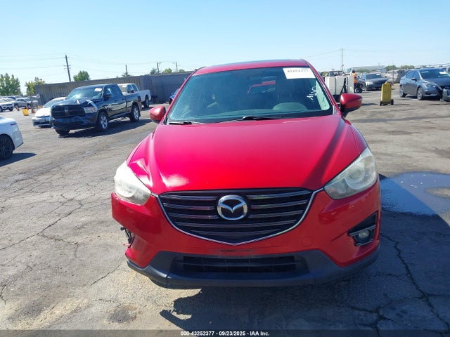 JM3KE2CY9G0833918 Mazda py