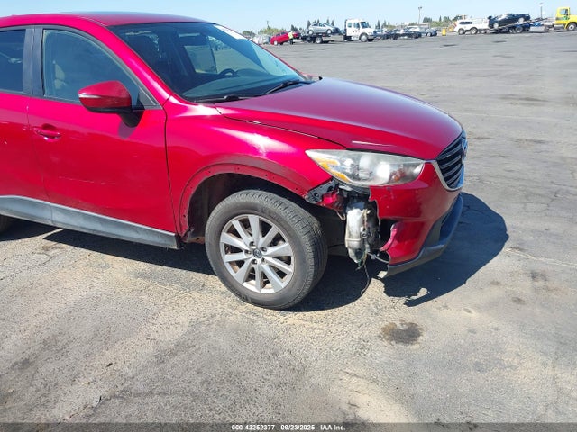 JM3KE2CY9G0833918 Mazda py