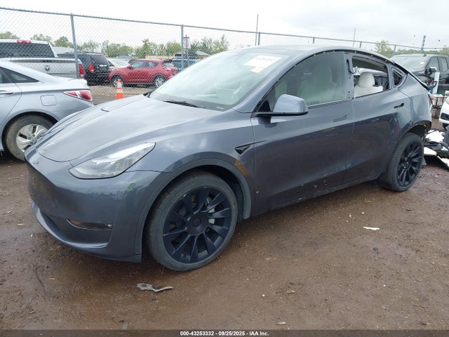 2023 TESLA MODEL Y 7SAYGDEE3PF890972 Photo 1