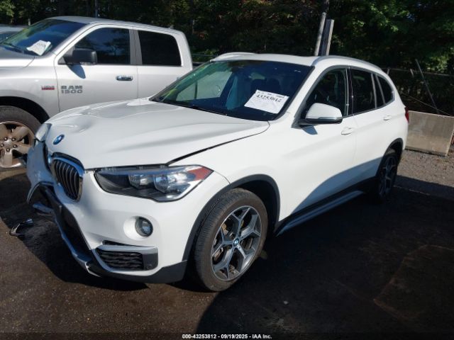 2019 BMW X1 WBXHT3C54K5L35662 Photo 1
