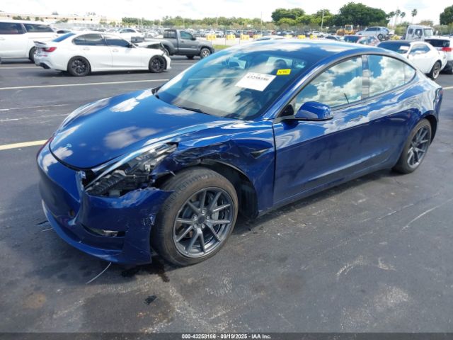 2023 TESLA MODEL 3 5YJ3E1EA3PF677688 Photo 1