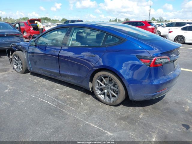 2023 TESLA MODEL 3 5YJ3E1EA3PF677688 Photo 2