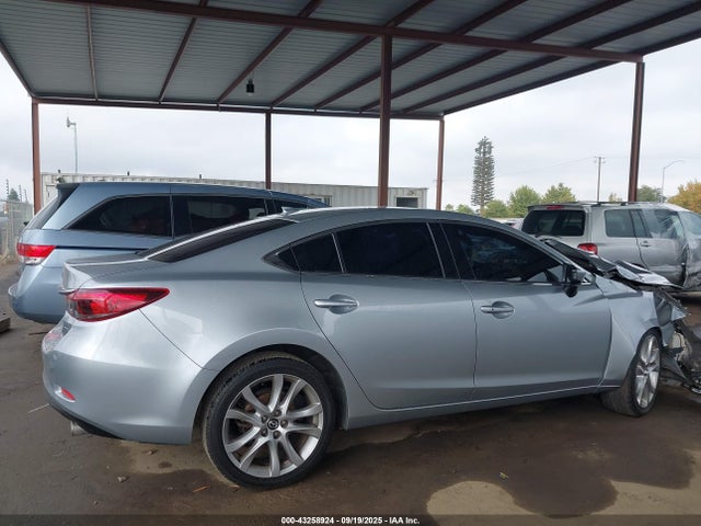 JM1GJ1T53G1444292 Mazda py