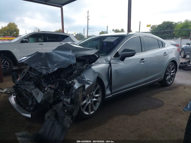 JM1GJ1T53G1444292 Mazda py