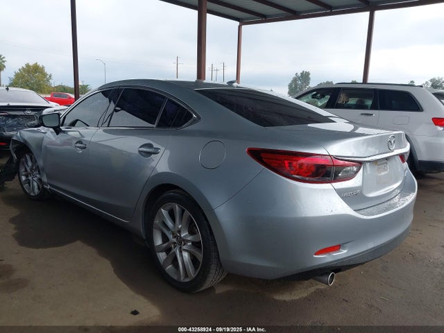 JM1GJ1T53G1444292 Mazda py
