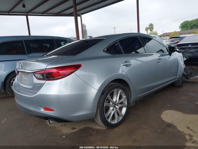JM1GJ1T53G1444292 Mazda py