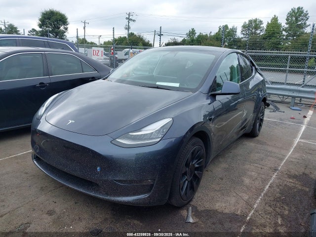 2021 TESLA MODEL Y 5YJYGAEE0MF299151 Photo 1