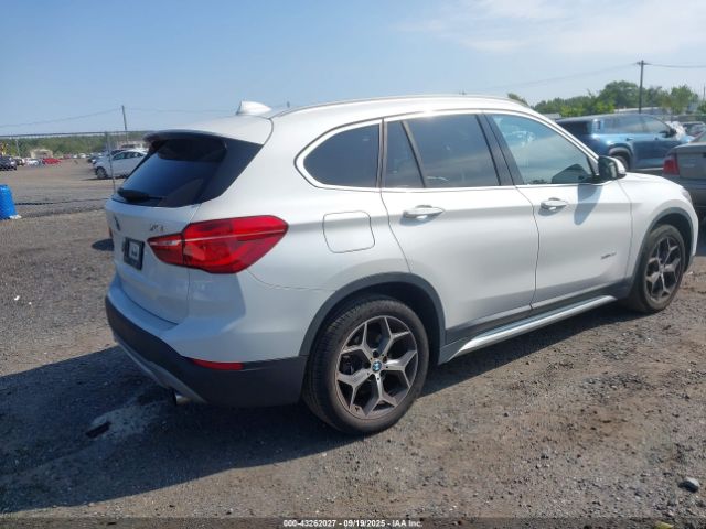 2016 BMW X1 WBXHT3C37GP887814 Photo 3