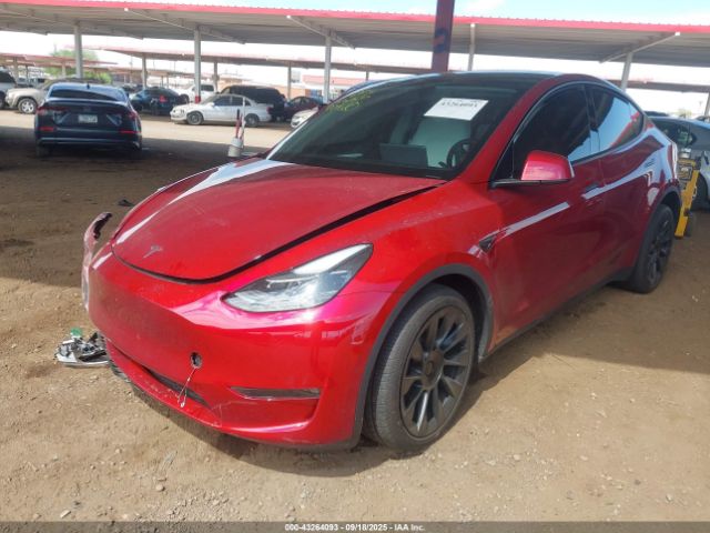 2024 TESLA MODEL Y 7SAYGAEE7RF149712 Photo 1