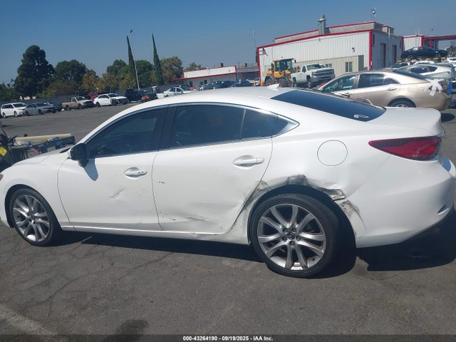 JM1GJ1V53G1442538 Mazda py