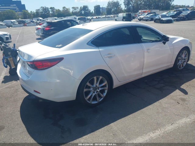 JM1GJ1V53G1442538 Mazda py