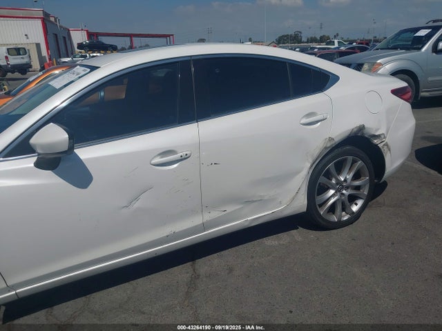 JM1GJ1V53G1442538 Mazda py