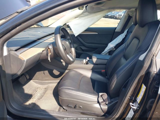 2023 TESLA MODEL 3 5YJ3E1EAXPF577975 Photo 4