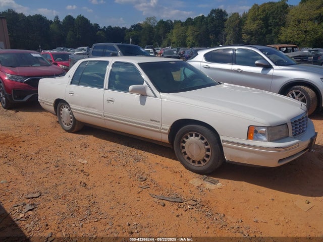 1999 CADILLAC DEVILLE 1G6KD54Y9XU778880 Photo 0
