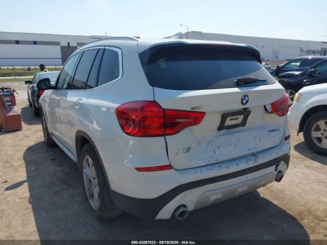 2019 BMW X3 5UXTR7C54KLR46458 Photo 2