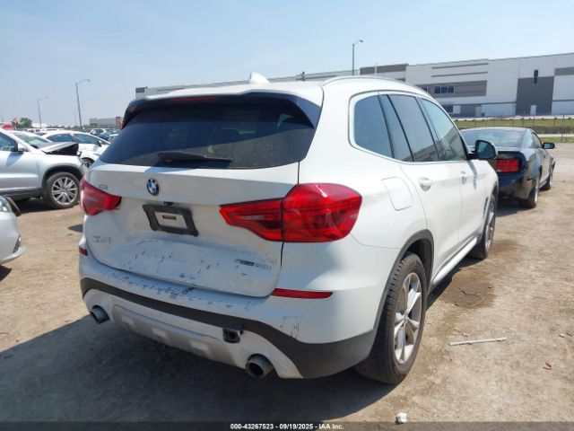 2019 BMW X3 5UXTR7C54KLR46458 Photo 3