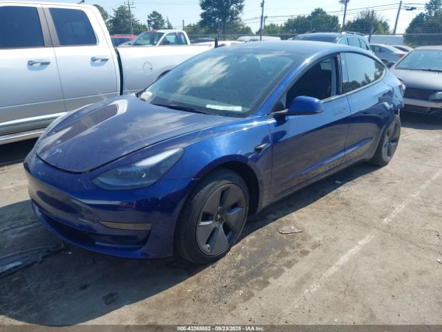 2023 TESLA MODEL 3 5YJ3E1EA8PF490527 Photo 1
