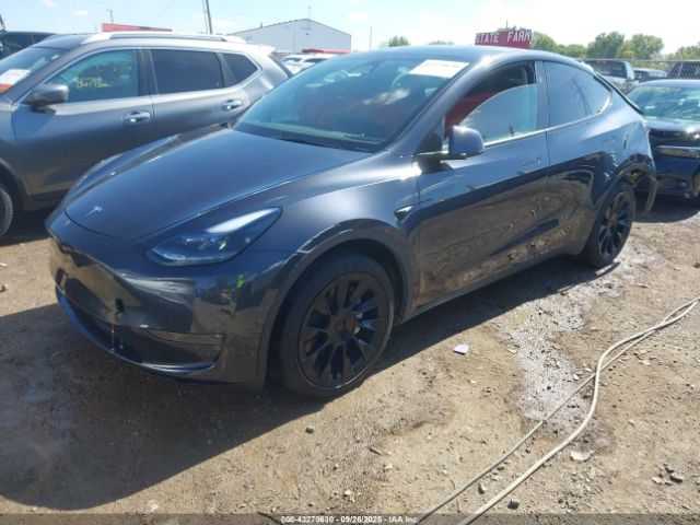 2024 TESLA MODEL Y 7SAYGDEE5RA249757 Photo 1