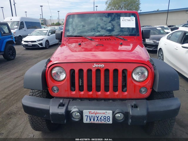 1C4HJWDG5EL174677 Jeep 2014
