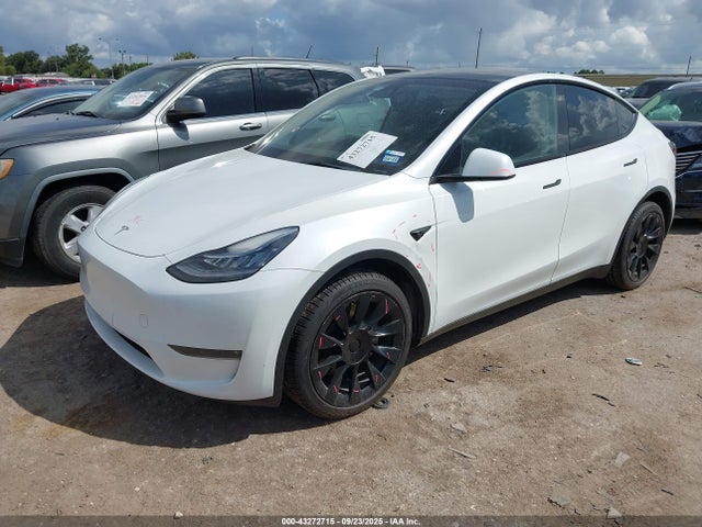 2023 TESLA MODEL Y 7SAYGDEE9PA103505 Photo 1