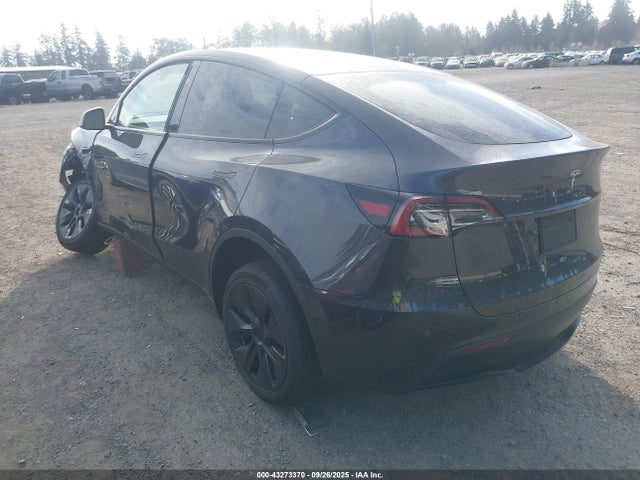 2025 TESLA MODEL Y 7SAYGDED0SF253005 Photo 2