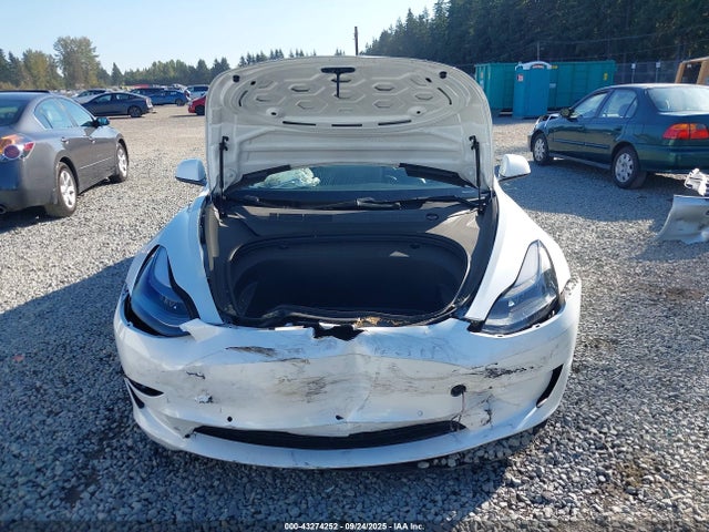 5YJ3E1EA2MF918331 Tesla 2021