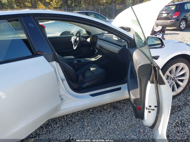 5YJ3E1EA2MF918331 Tesla 2021