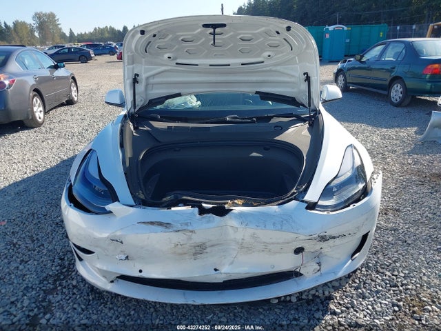 5YJ3E1EA2MF918331 Tesla 2021